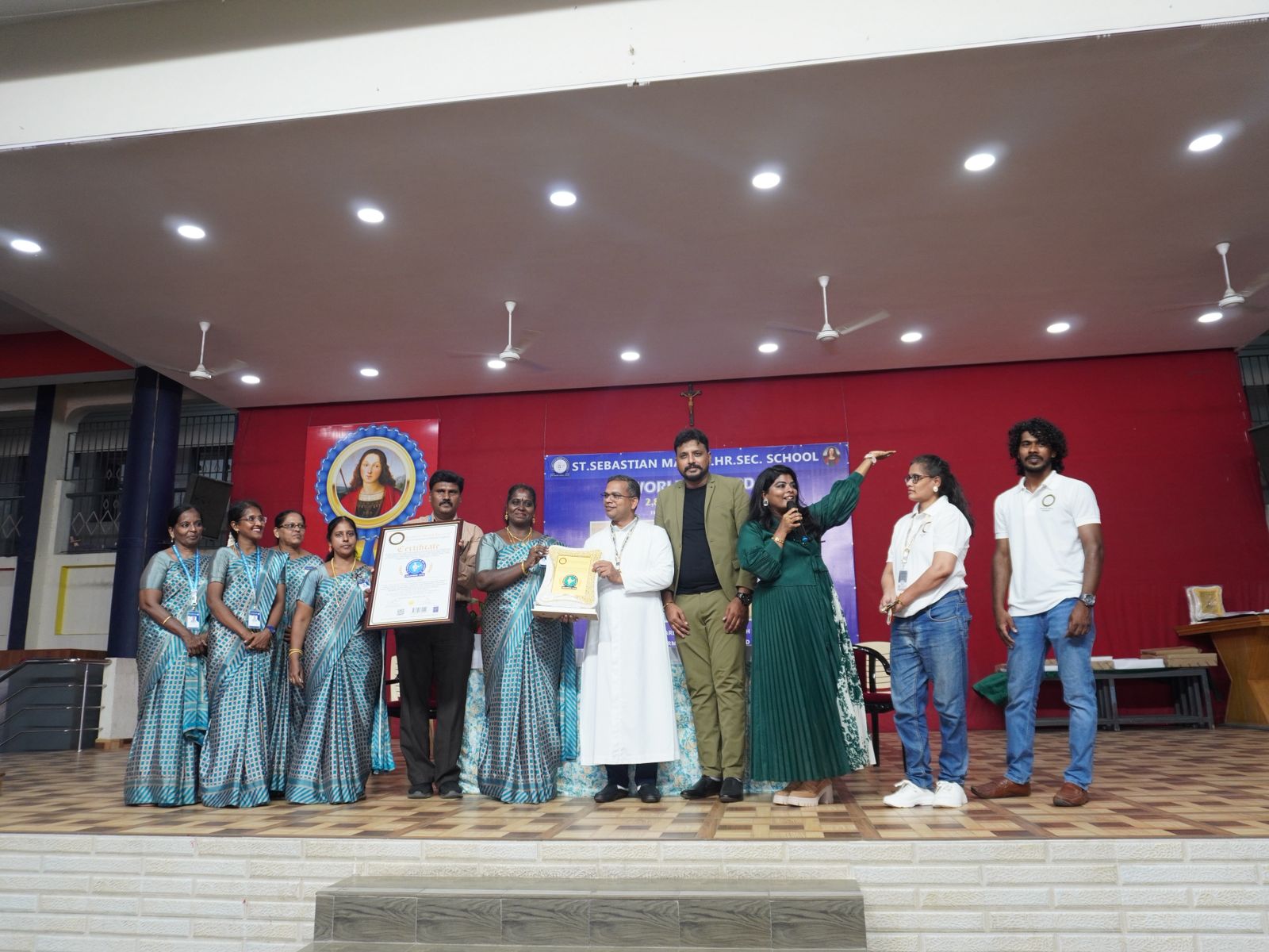 The Largest Human Motion Formation Depicting a Woman Walking with a Lantern and a Book, Achieved by 2,821 Individuals, under the Theme ‘Marching Towards Well-being through Literacy.